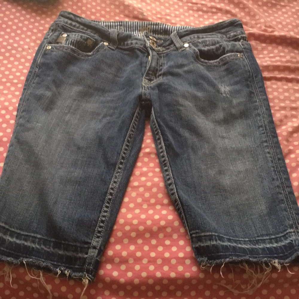A pair of jean cut offs